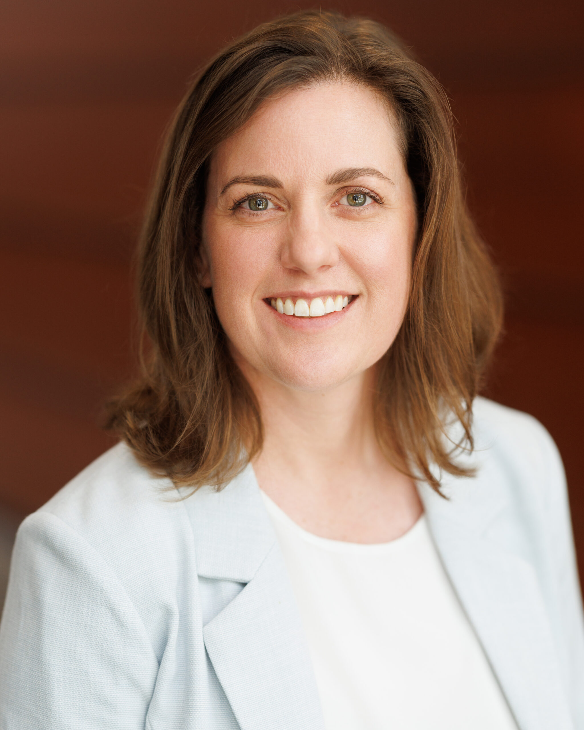 Angela DeWilde : Executive Director & CEO
